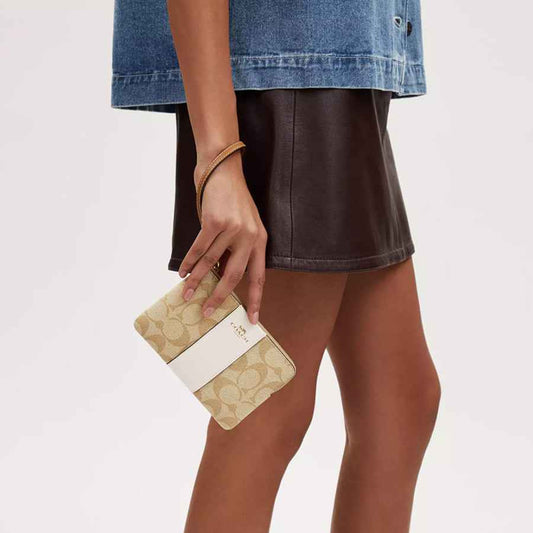 Coach Corner Zip Wristlet In Signature Canvas With Stripe Light Khaki
