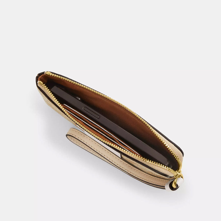 Coach Corner Zip Wristlet In Signature Canvas With Stripe Light Khaki 