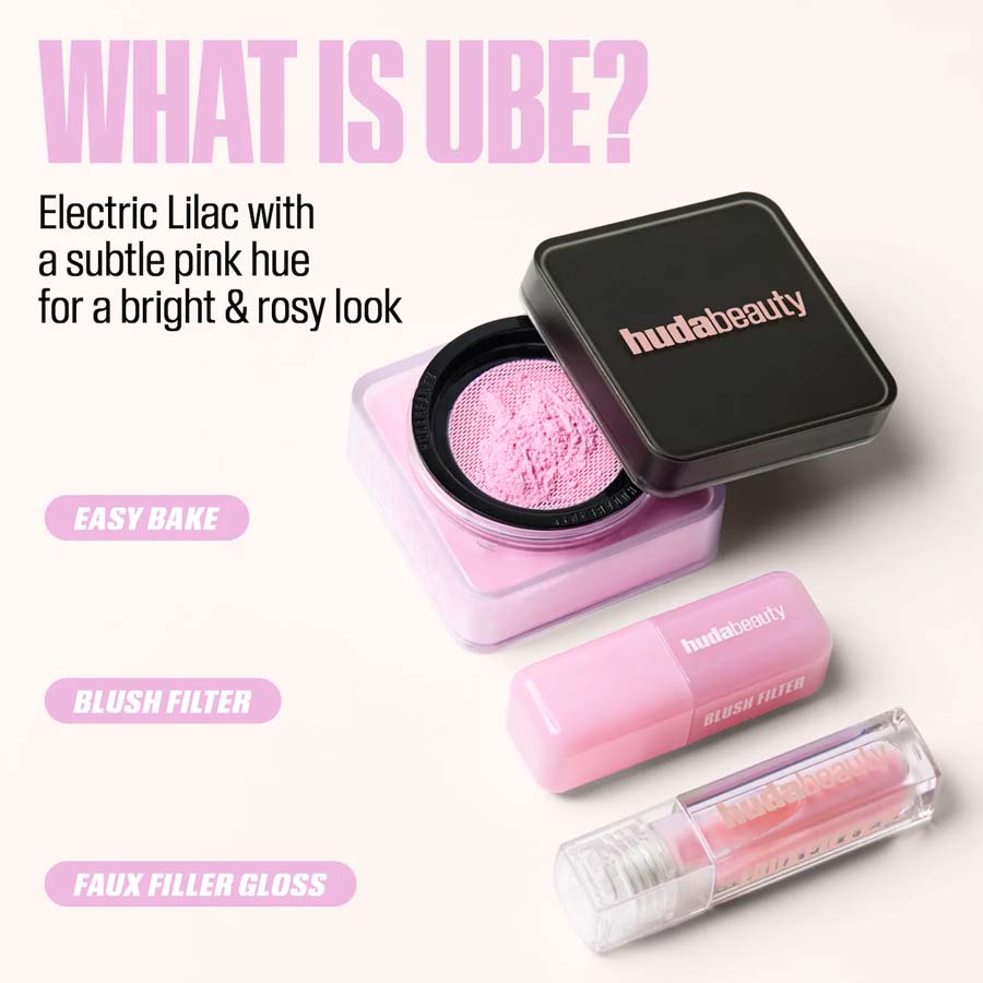 Huda Beauty makeup products with pink powder, blush filter, and gloss on a white background.