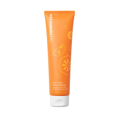 Orange tube of Ole Henriksen Truth Truth Juice Daily Cleanser on a white background