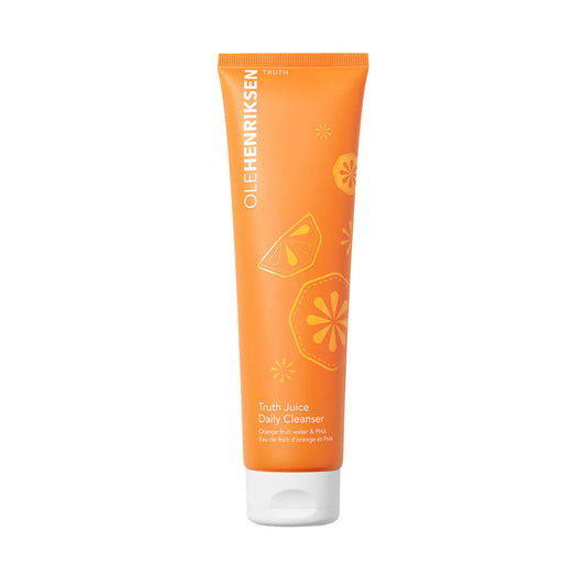 Orange tube of Ole Henriksen Truth Truth Juice Daily Cleanser on a white background